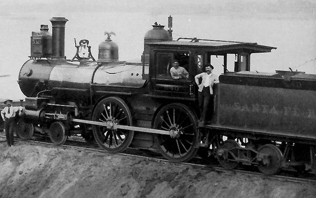 Locomotive with Engineer and Fireman posing, Santa Fe tender.